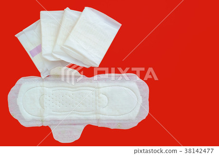 Feminine sanitary napkin on red background Feminine sanitary napkin on red background 38142477