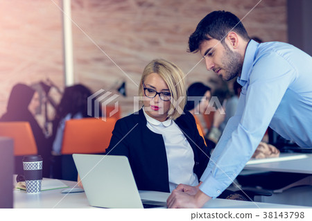 Skilled professional blonde female CEO explaining Skilled professional blonde female CEO explaining 38143798
