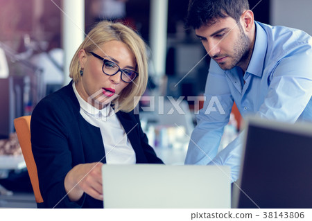 Skilled professional blonde female CEO explaining Skilled professional blonde female CEO explaining 38143806