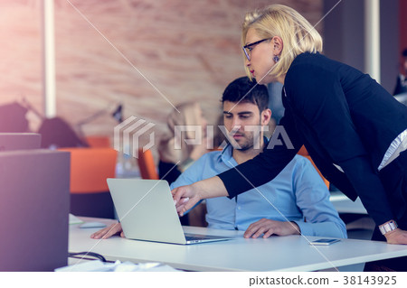 Skilled professional blonde female CEO explaining Skilled professional blonde female CEO explaining 38143925