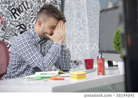 Side profile shot of frustrated young brunet 38144845