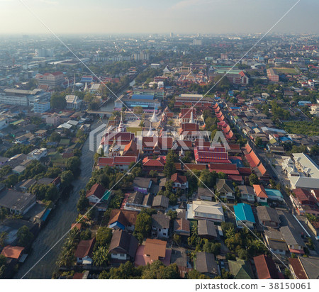 Flying above Wat Nang Ratchawihan in Bangkok City, Thailand. 38150061