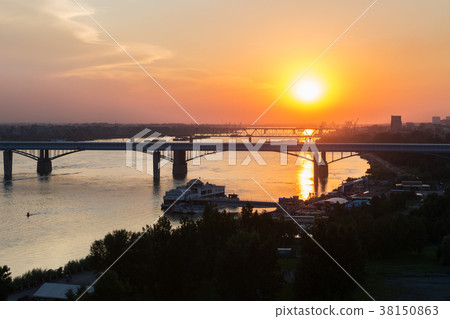 Beautiful sunset over the Octyabrsky bridge across 38150863