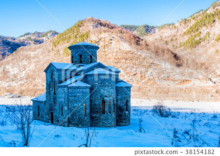 Central medieval church in Arkhyz in winter Central medieval church in Arkhyz in winter 38154182