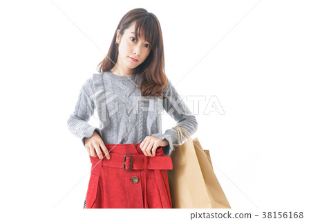 Women buying clothes 38156168