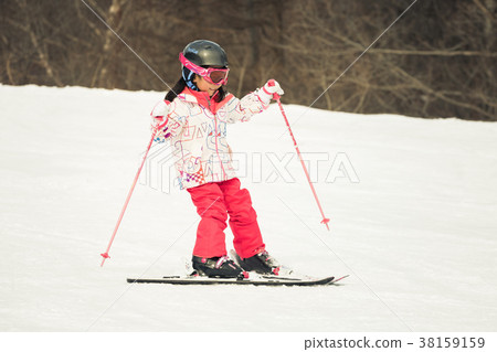 Children enjoy skiing 38159159