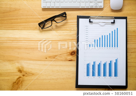 Office desk table with data analysis chart Office desk table with data analysis chart 38160051