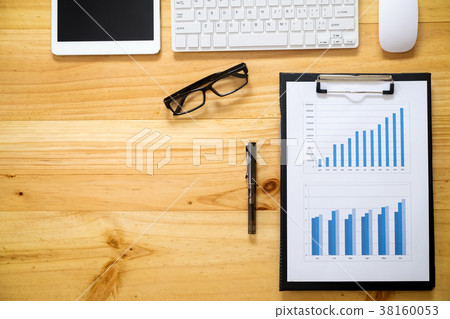 Office desk table with data analysis chart Office desk table with data analysis chart 38160053