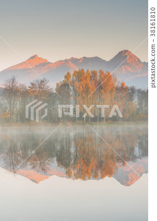 Stunning high peak reflection in lake Stunning high peak reflection in lake 38161810