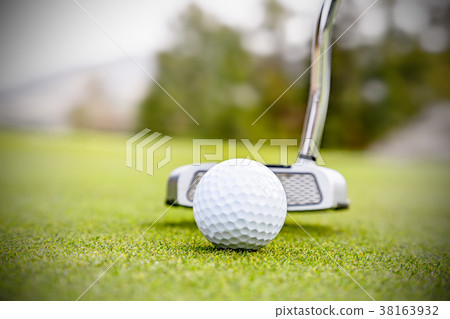 Golf course green and ball 38163932