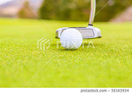 Golf course green and ball Golf course green and ball 38163934
