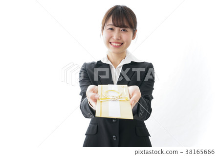 Woman in suit passing a congratulatory bag Woman in suit passing a congratulatory bag 38165666