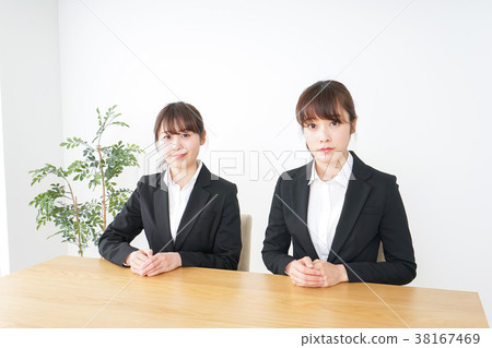 Two young business women Two young business women 38167469