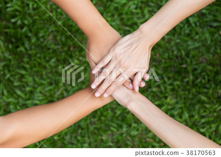 closeup hands putting together closeup hands putting together 38170563