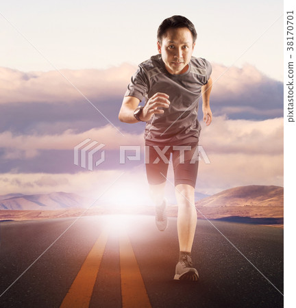 younger running man on asphalt highway  38170701