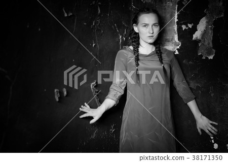 young girl portrait in an old house with burnt 38171350
