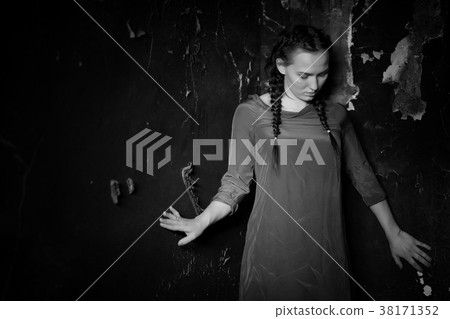 young girl portrait in an old house with burnt 38171352