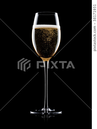 Elegant glass of yellow champagne with bubbles 38171931