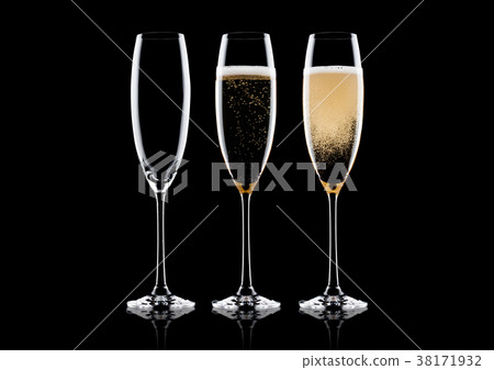 Elegant glasses of yellow champagne with bubbles Elegant glasses of yellow champagne with bubbles 38171932