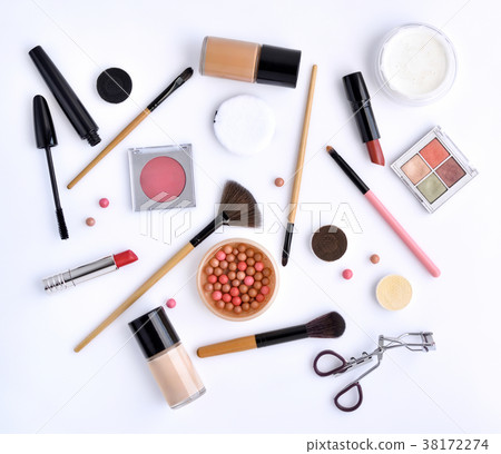 Makeup brush and decorative cosmetics on a white 38172274