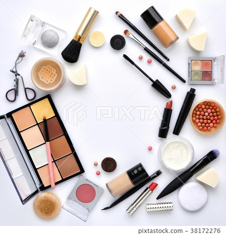 Makeup brush and decorative cosmetics on a white 38172276