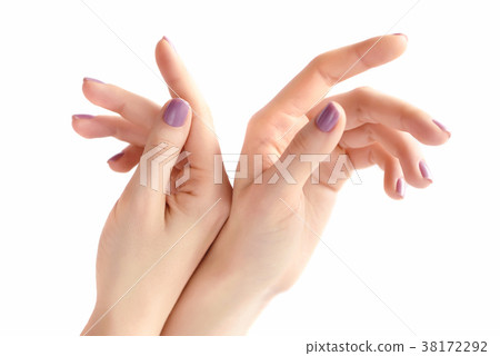 Hands of young woman with pink manicure 38172292