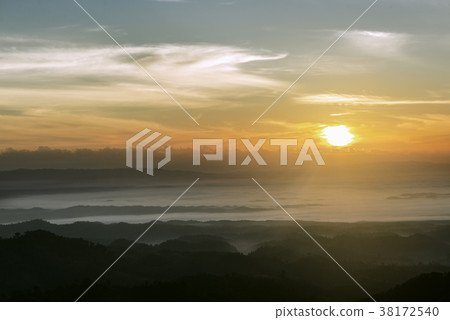 Cloudy skies and stunning hilltop in winter. Cloudy skies and stunning hilltop in winter. 38172540