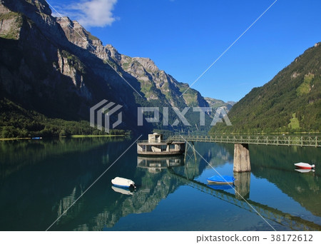 Quiet summer day at lake Klontalersee. Glarnisch. Quiet summer day at lake Klontalersee. Glarnisch. 38172612
