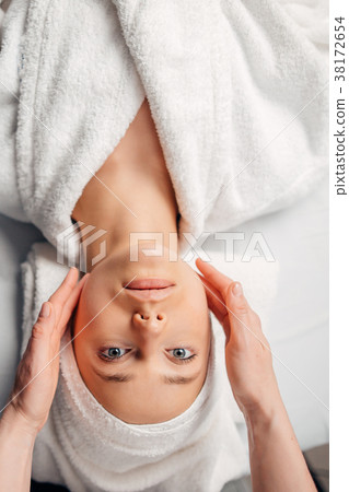 girl having spa facial massage in luxurious beauty 38172654