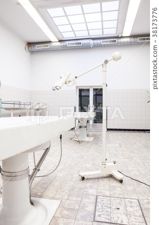 Autopsy tables in morgue 38173776