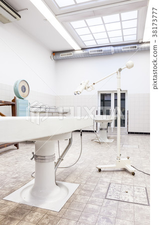 Autopsy tables in morgue 38173777