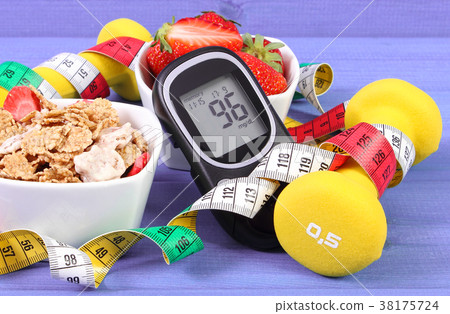 Glucose meter with sugar level, healthy food Glucose meter with sugar level, healthy food 38175724