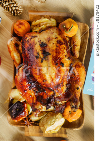 roasted chicken on Christmas table roasted chicken on Christmas table 38178422