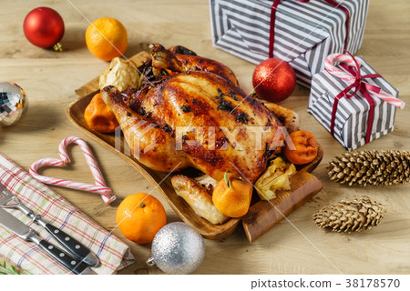 roasted chicken on Christmas table roasted chicken on Christmas table 38178570