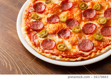 pizza on wood background pizza on wood background 38178663