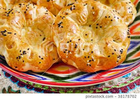 uzbek bread on the wooden board uzbek bread on the wooden board 38178702