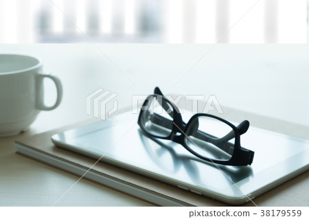 Close up of glasses and computer business Close up of glasses and computer business 38179559
