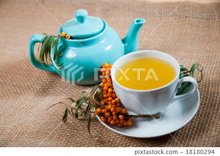 Sea buckthorn tea with a on white background Sea buckthorn tea with a on white background 38180294