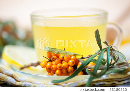 Sea buckthorn tea with a on white background 38180310