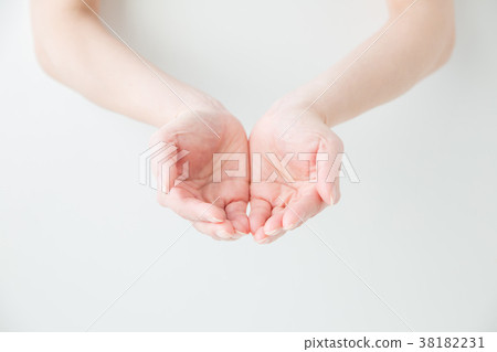 Hand with something [with clipping path] 38182231