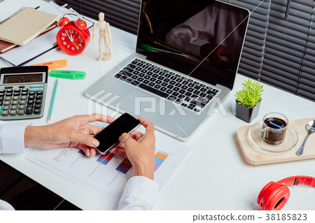 Businessman working and using smart phone 38185823