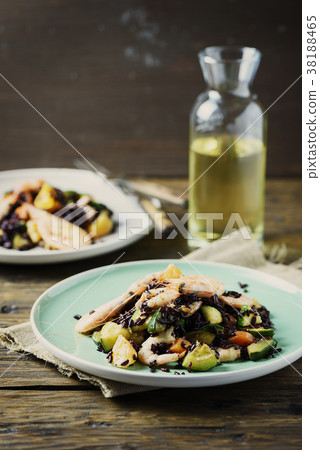 Black rice with prawns, vegetables and orange Black rice with prawns, vegetables and orange 38188465