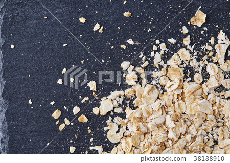 Yellow oats pyramid positioned in the corner on a 38188910