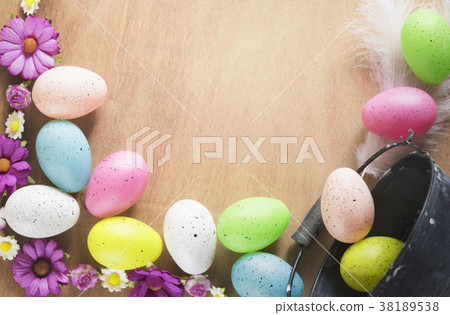 Colorful flowers and Easter eggs Colorful flowers and Easter eggs 38189538