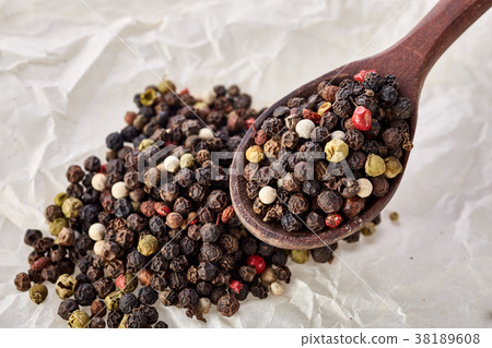 Shichimi pepper in Wooden spoon on crumpled paper Shichimi pepper in Wooden spoon on crumpled paper 38189608