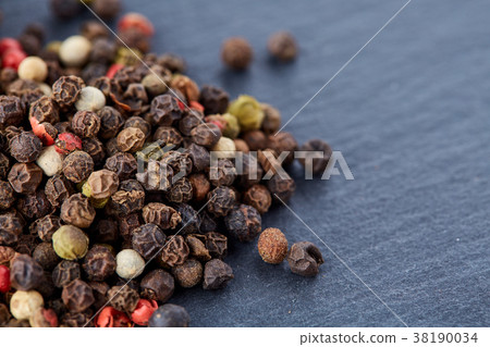 mixture of pepper peas powder scattered on a slate mixture of pepper peas powder scattered on a slate 38190034