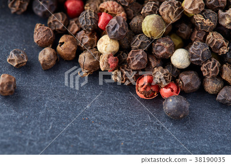 mixture of pepper peas powder scattered on a slate mixture of pepper peas powder scattered on a slate 38190035