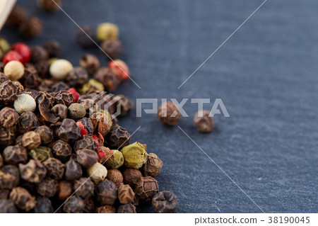 mixture of pepper peas powder scattered on a slate mixture of pepper peas powder scattered on a slate 38190045
