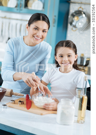Inspired mom and girl making some dough Inspired mom and girl making some dough 38192564
