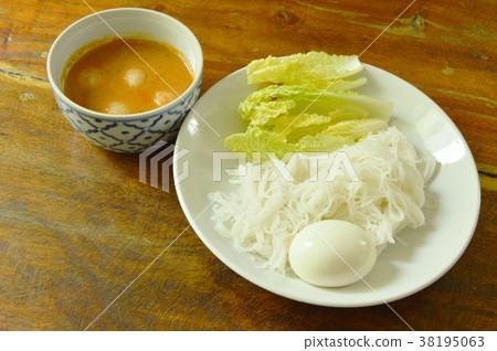 rice noodles and boiled egg with fish curry rice noodles and boiled egg with fish curry 38195063